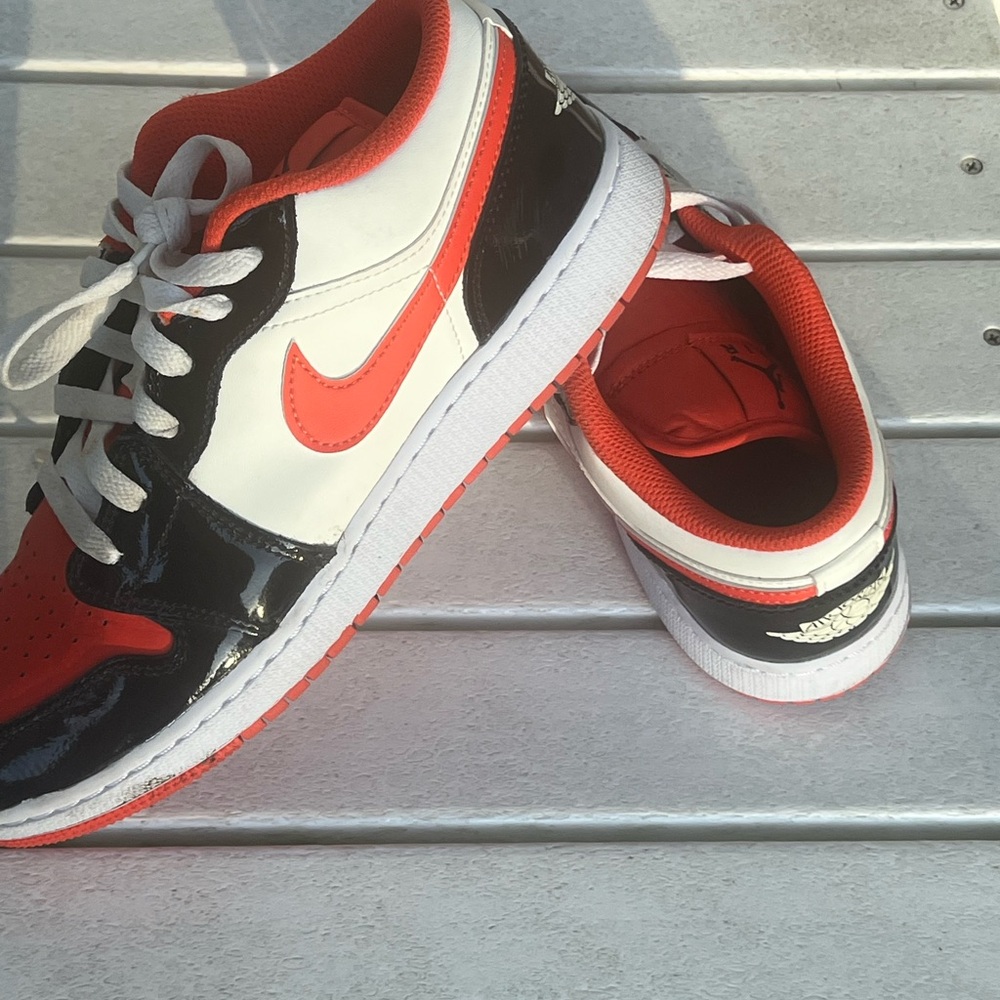 Nike Black and Orange Sneakers with White Details